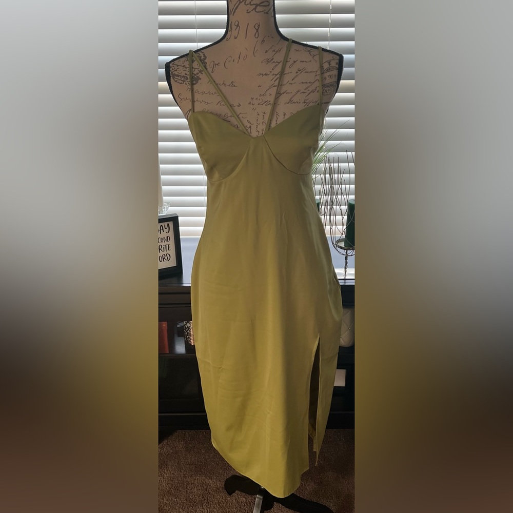 Lulu’s green silky dress